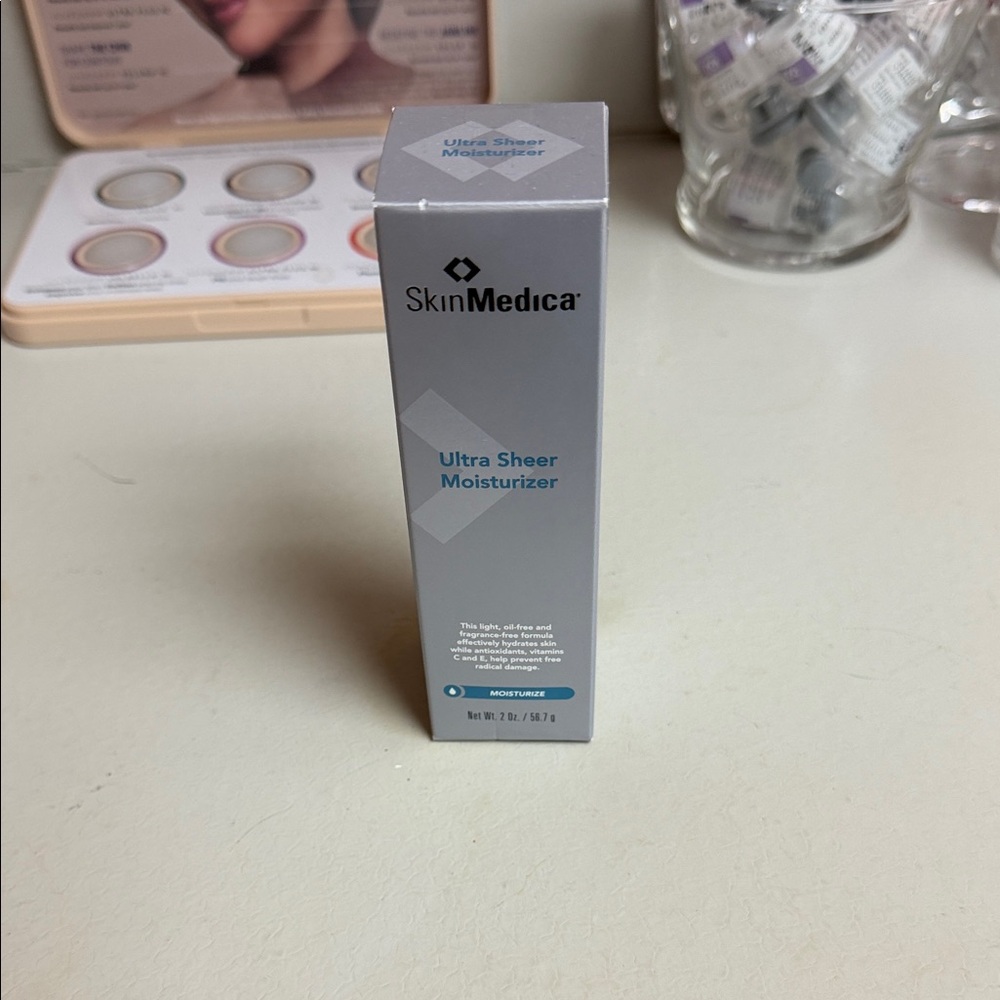 SkinMedica Ultra Sheer Moisturizer in Light Gray Box